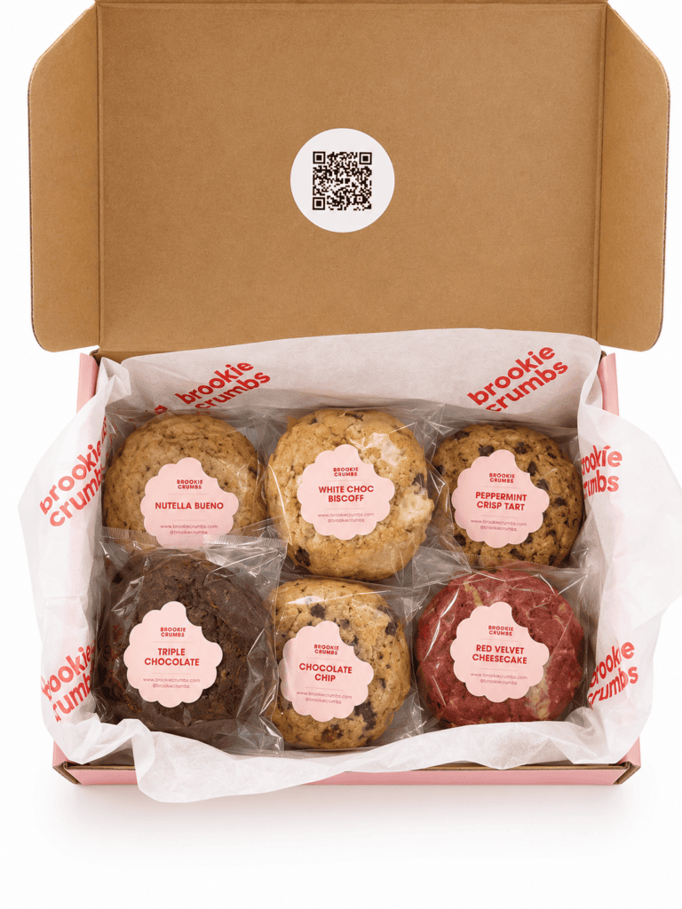 Brookie Crumbs cookie box open to show thick bakery-style cookies with golden edges